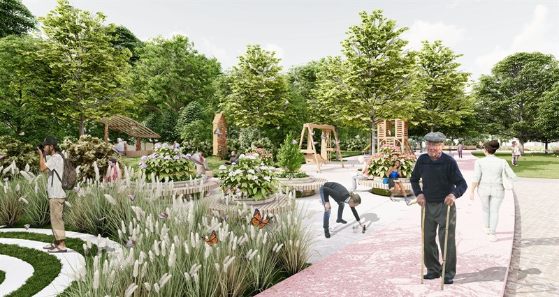 The quiet end of the scheme: raised planting beds edged in woven willow, ornamental grasses and butterflies in the foreground, a timber shelter and a play structure beyond, and an older man walking the activity lane with two sticks.