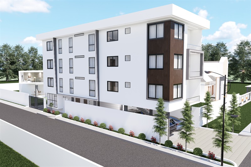 St. Luke Apartment from the road: four storeys in white render with a timber-clad bay running up the near corner.