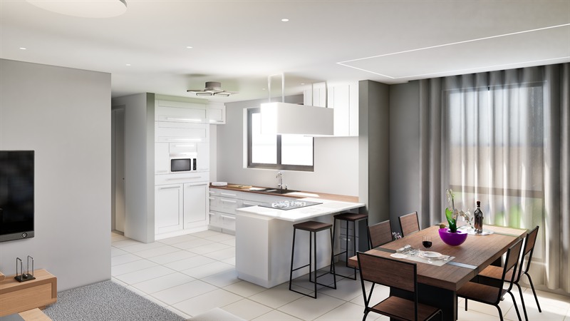 The kitchen and dining area at St. Luke Apartment, with a peninsula and stools between the run of units and the dining table at the window.